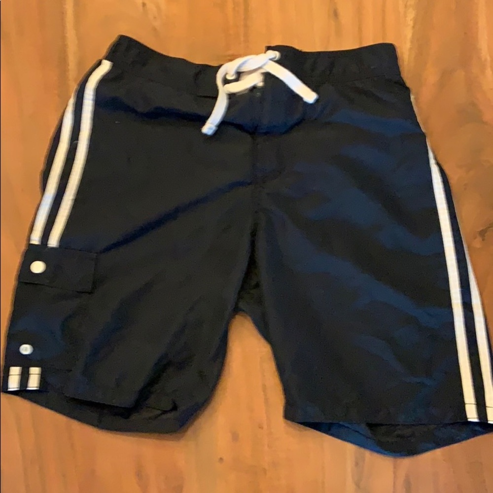 Men’s navy blue swim shorts.